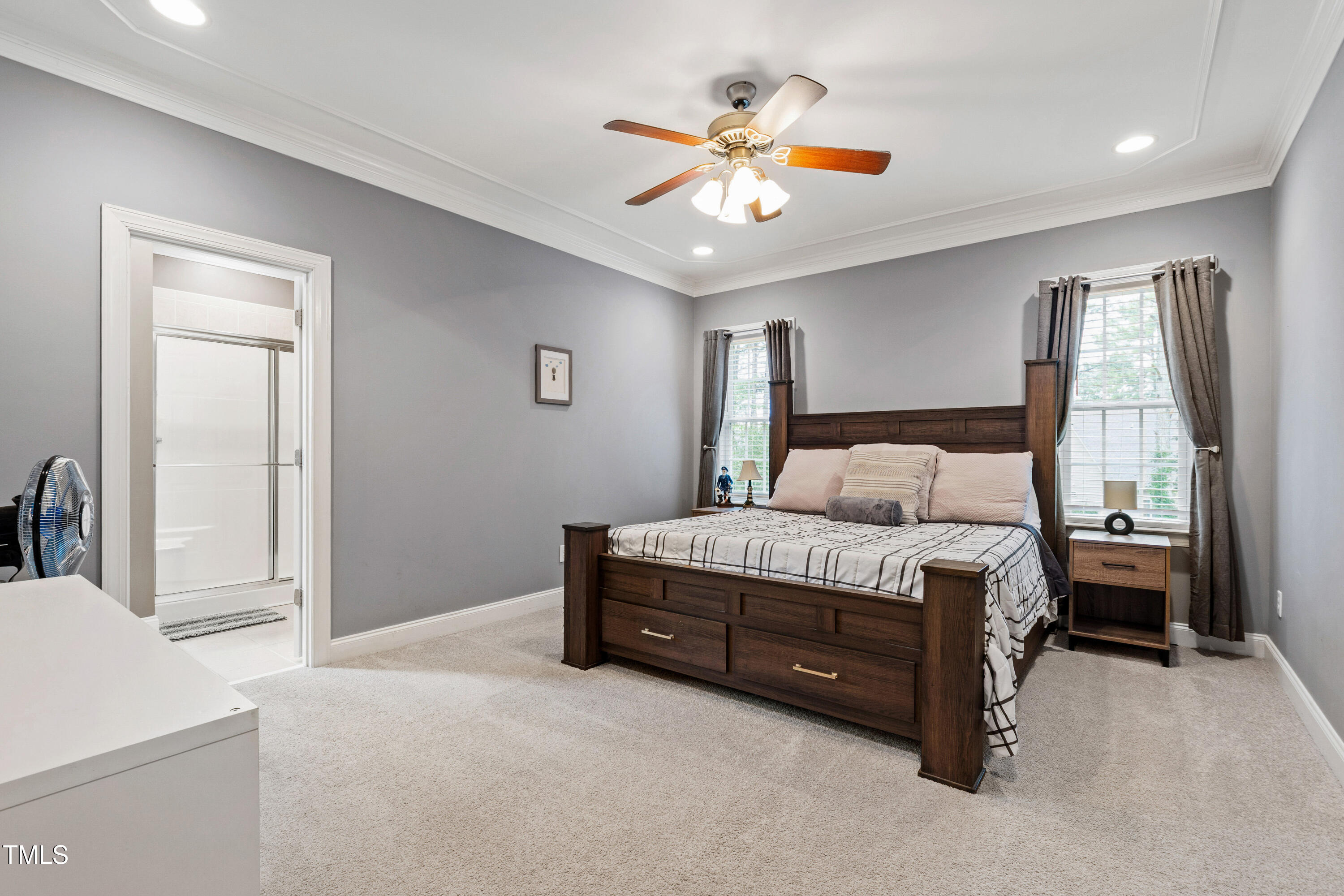 409 Broadmoor Way Clayton, NC 27520 - Photo 25 of 55 a bedroom with bed and window