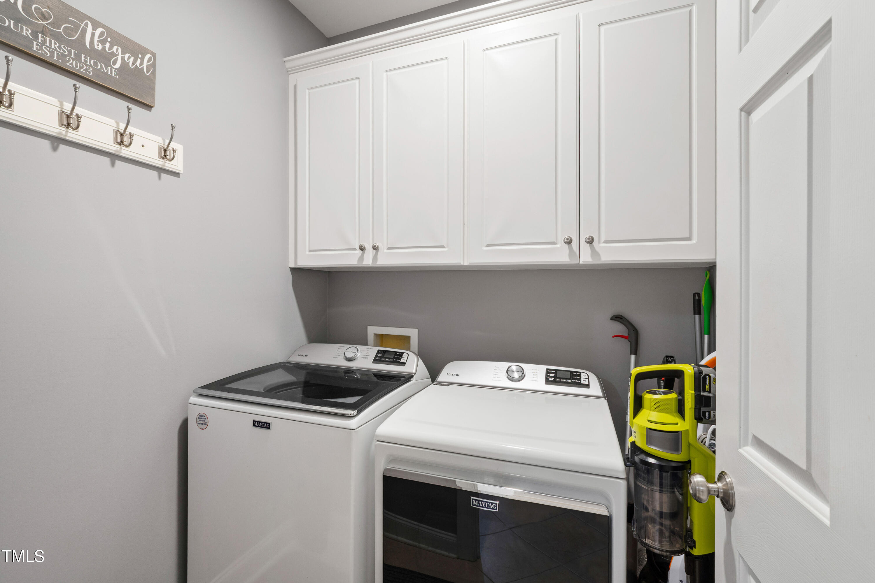 409 Broadmoor Way Clayton, NC 27520 - Photo 31 of 55 a utility room with dryer and washer