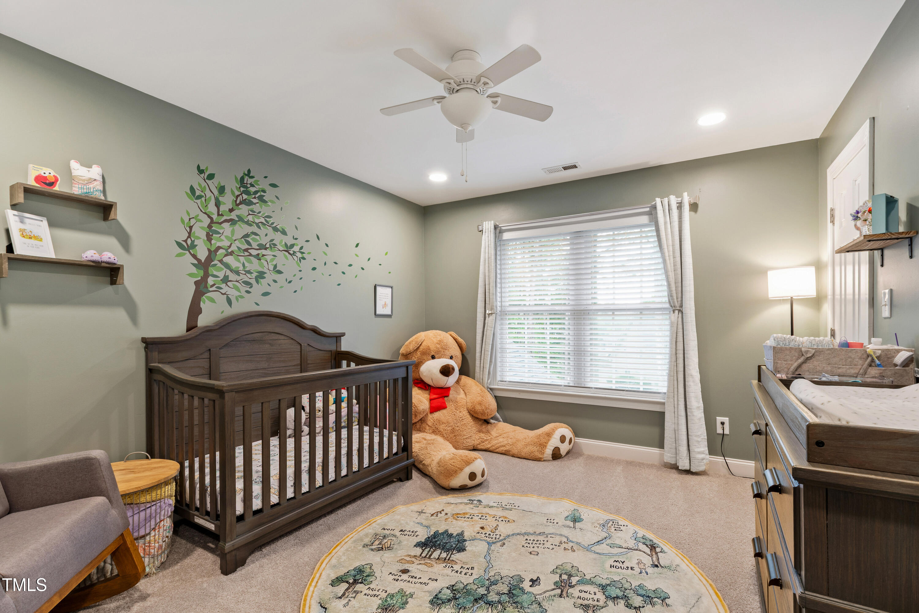 409 Broadmoor Way Clayton, NC 27520 - Photo 36 of 55 a bedroom with furniture and a window