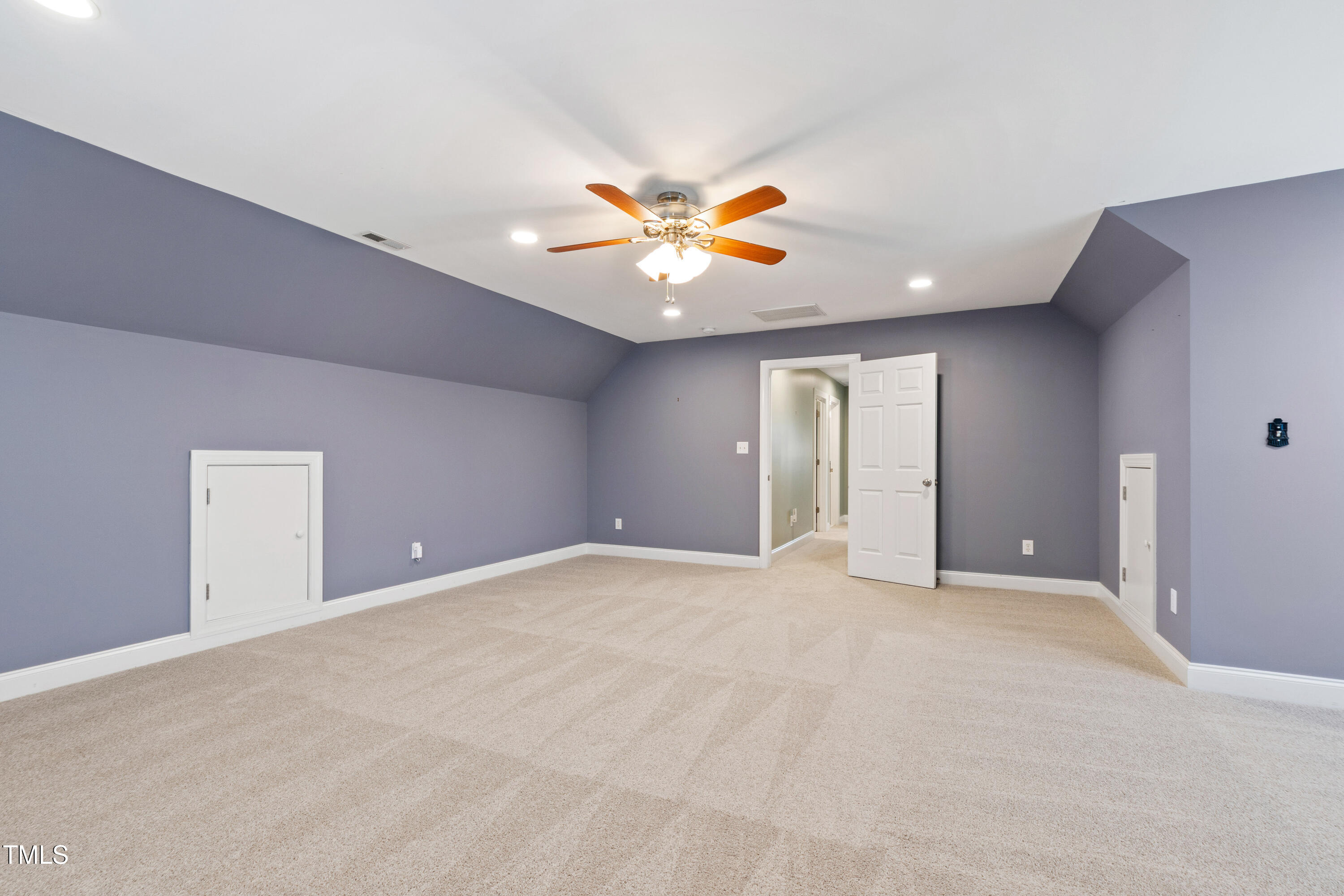 409 Broadmoor Way Clayton, NC 27520 - Photo 43 of 55 a view of an empty room with a window