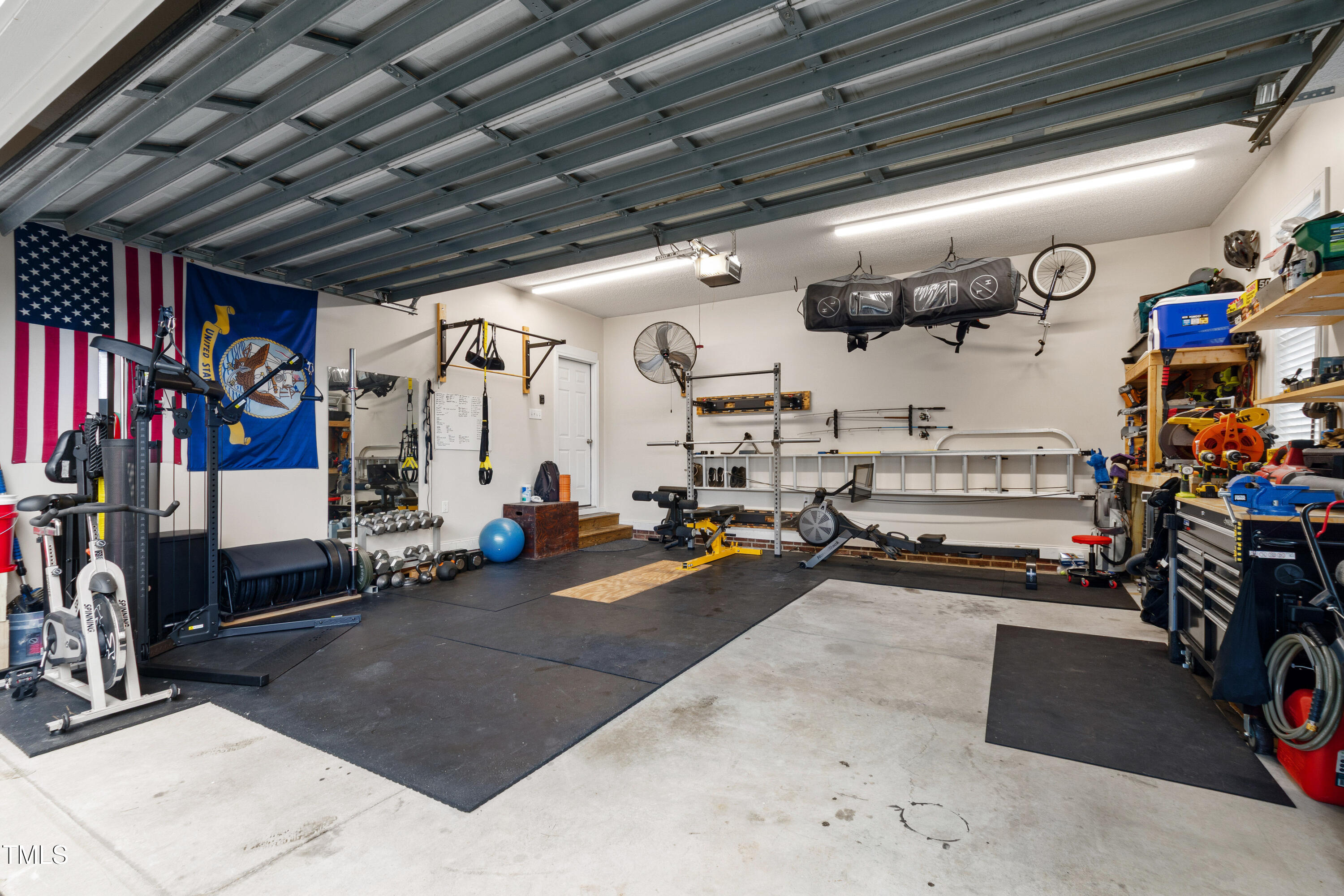 409 Broadmoor Way Clayton, NC 27520 - Photo 44 of 55 a view of a room with gym equipment