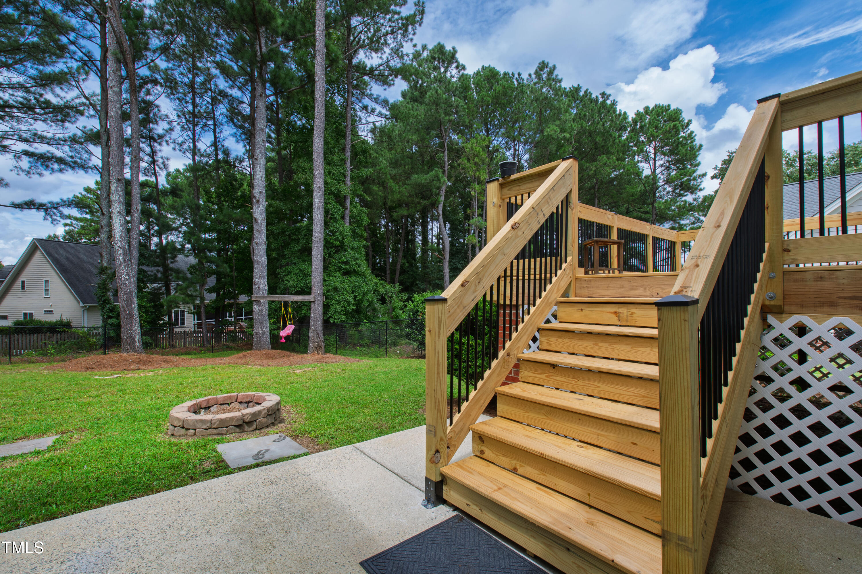 409 Broadmoor Way Clayton, NC 27520 - Photo 50 of 55 a view of backyard with swimming pool and outdoor seating