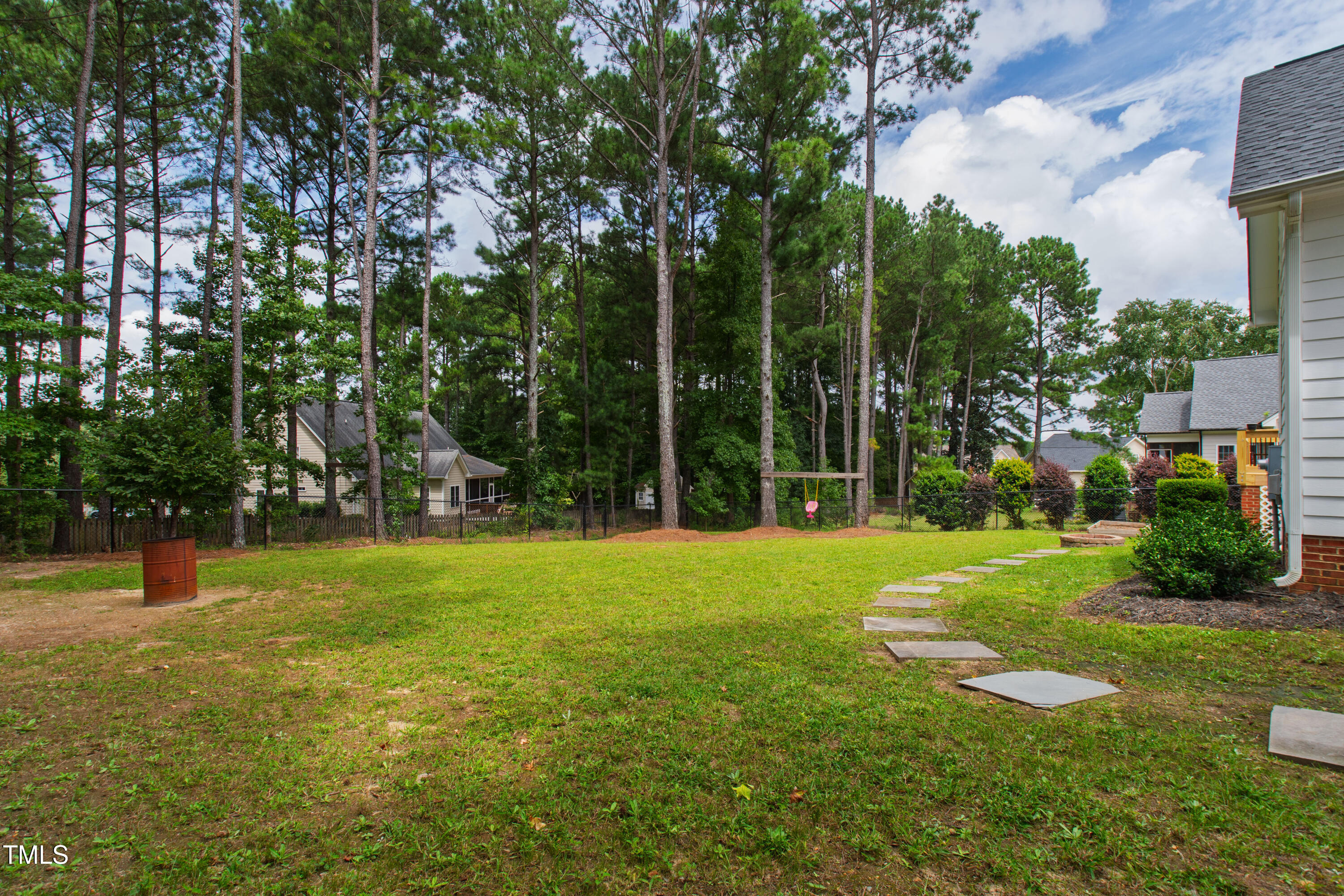 409 Broadmoor Way Clayton, NC 27520 - Photo 52 of 55 a view of a park with large trees