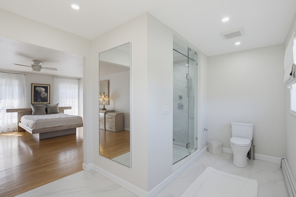 226 Olympic Road Somerset, MA 02726 - Photo 20 of 42 a spacious bathroom with a shower and a toilet