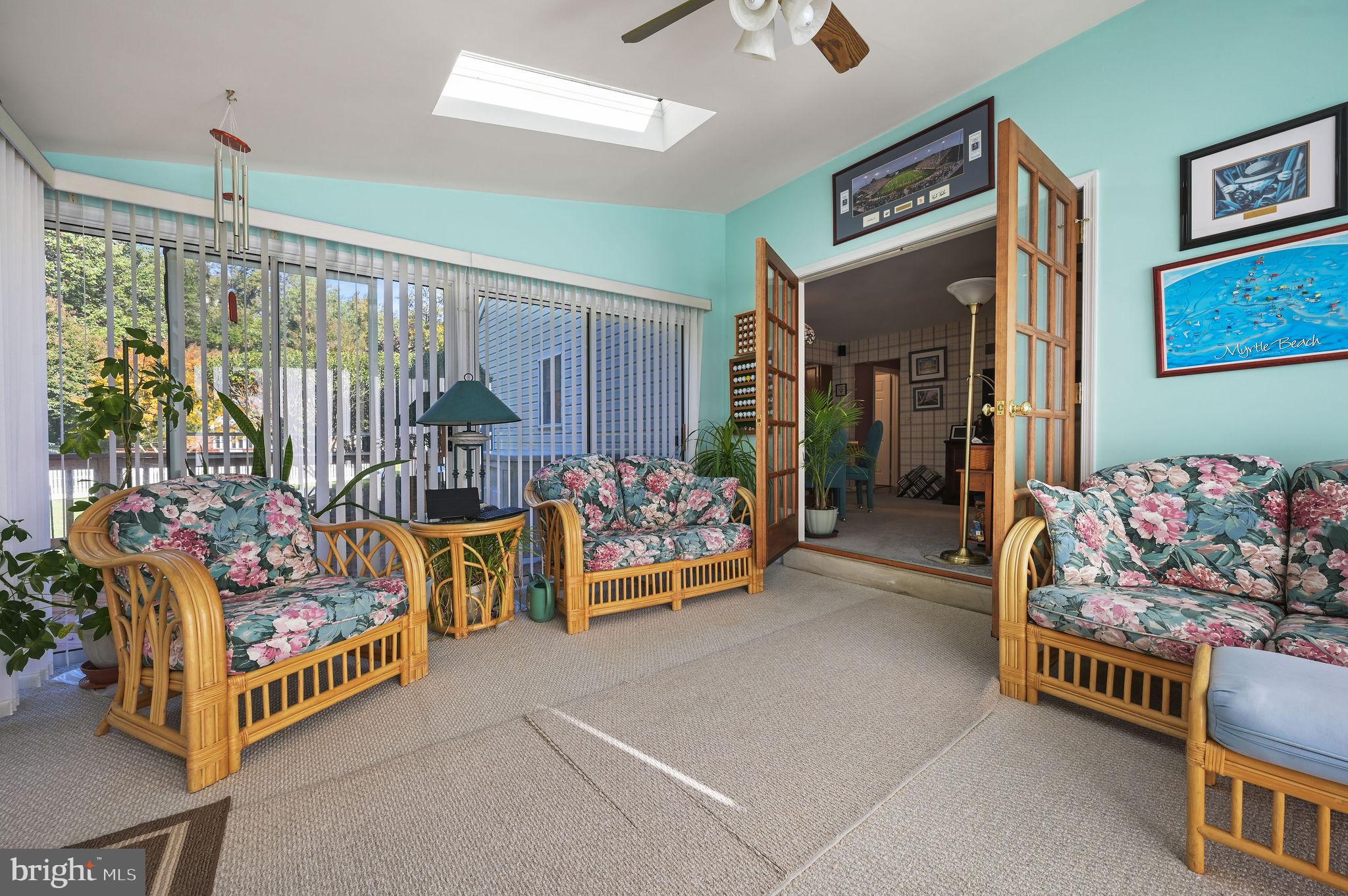164 Burning Tree Road Dover, DE 19904 - Photo 15 of 37 a bedroom with furniture and a flat screen tv