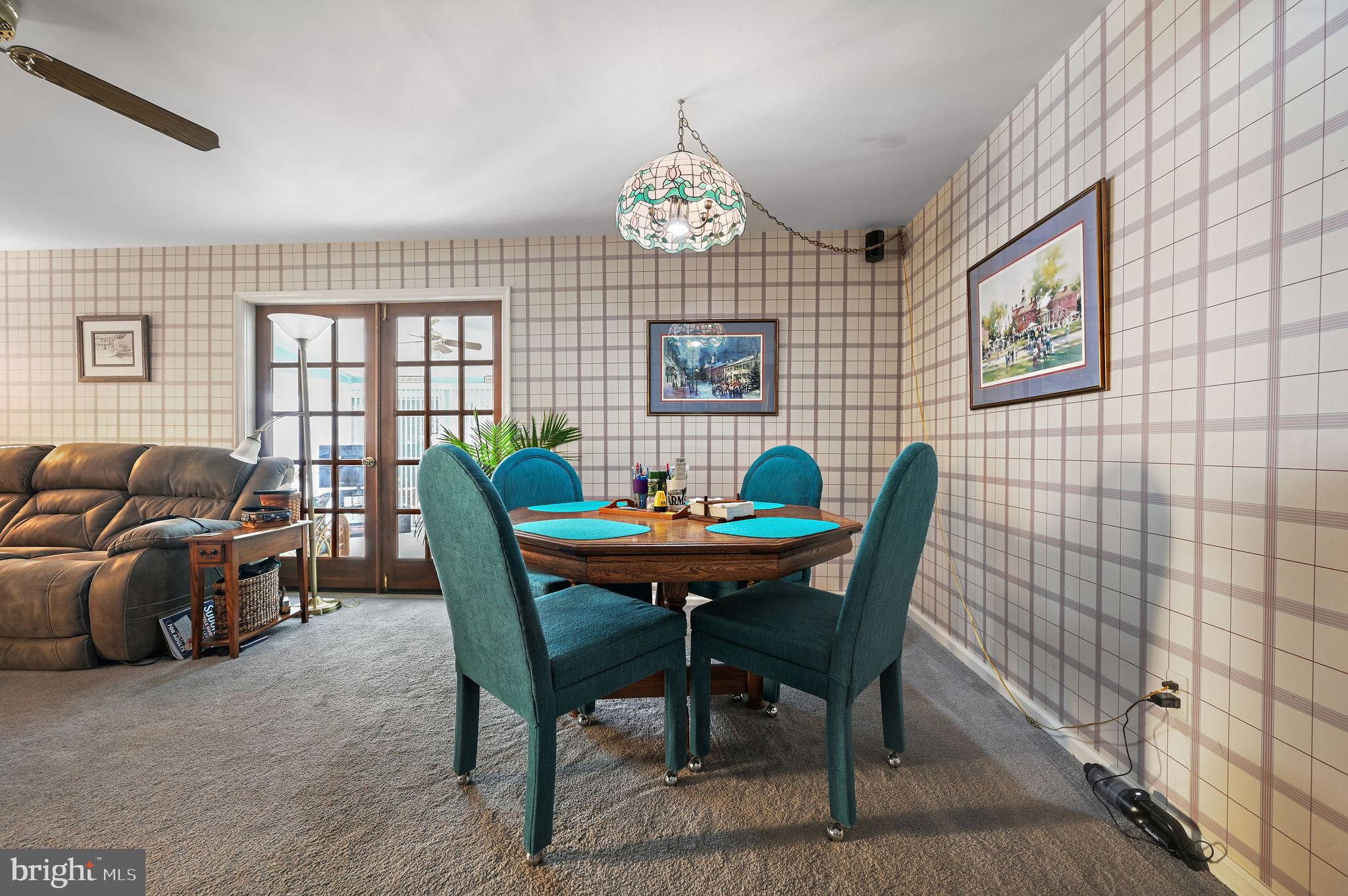 164 Burning Tree Road Dover, DE 19904 - Photo 17 of 37 a view of a dining room with furniture