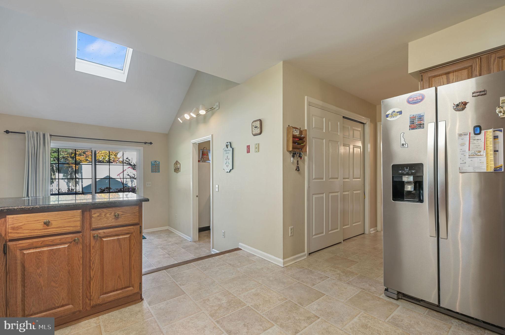 164 Burning Tree Road Dover, DE 19904 - Photo 24 of 37 a view of a kitchen with refrigerator and cabinet
