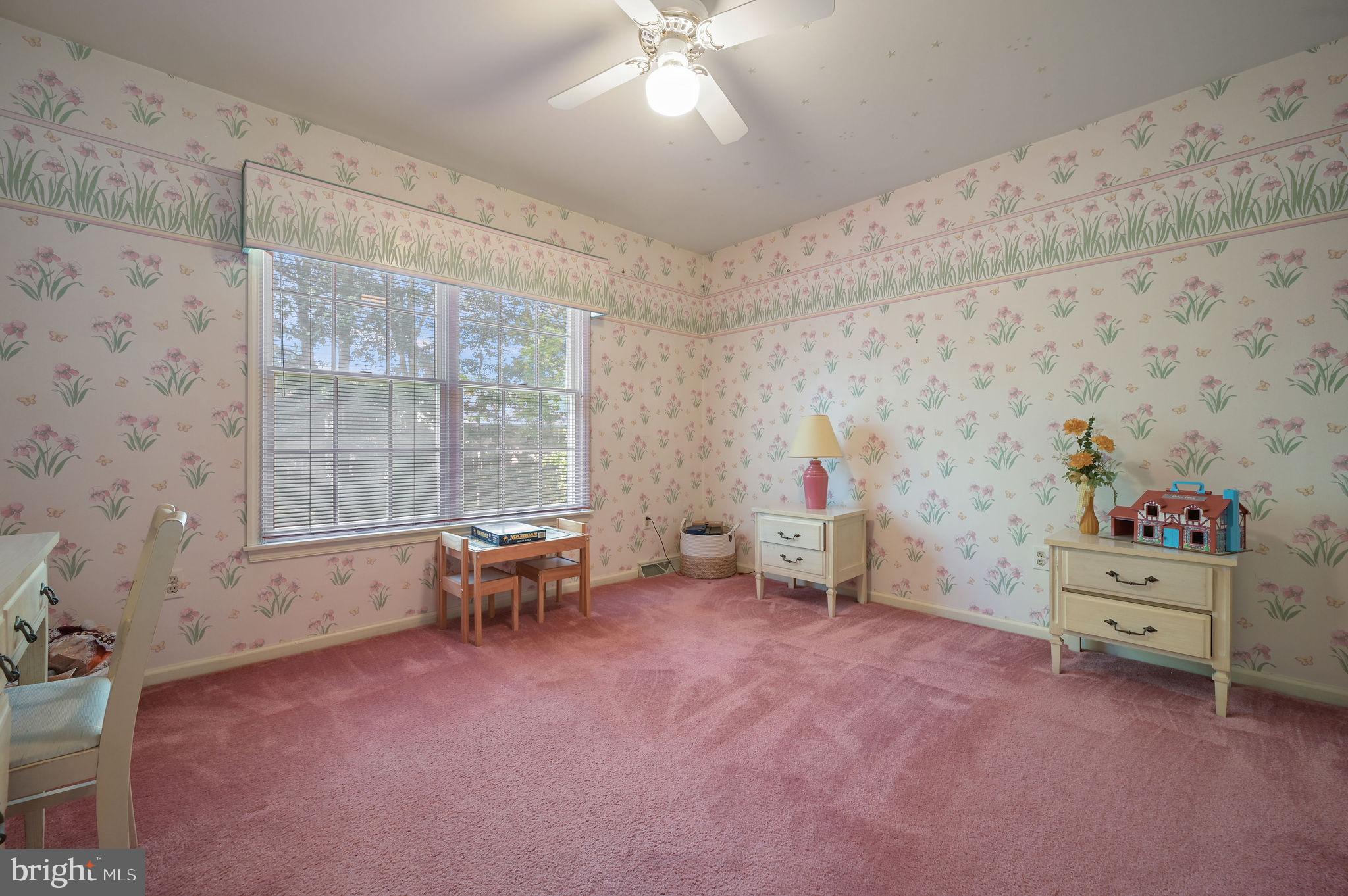 164 Burning Tree Road Dover, DE 19904 - Photo 35 of 37 a living room with furniture and a window