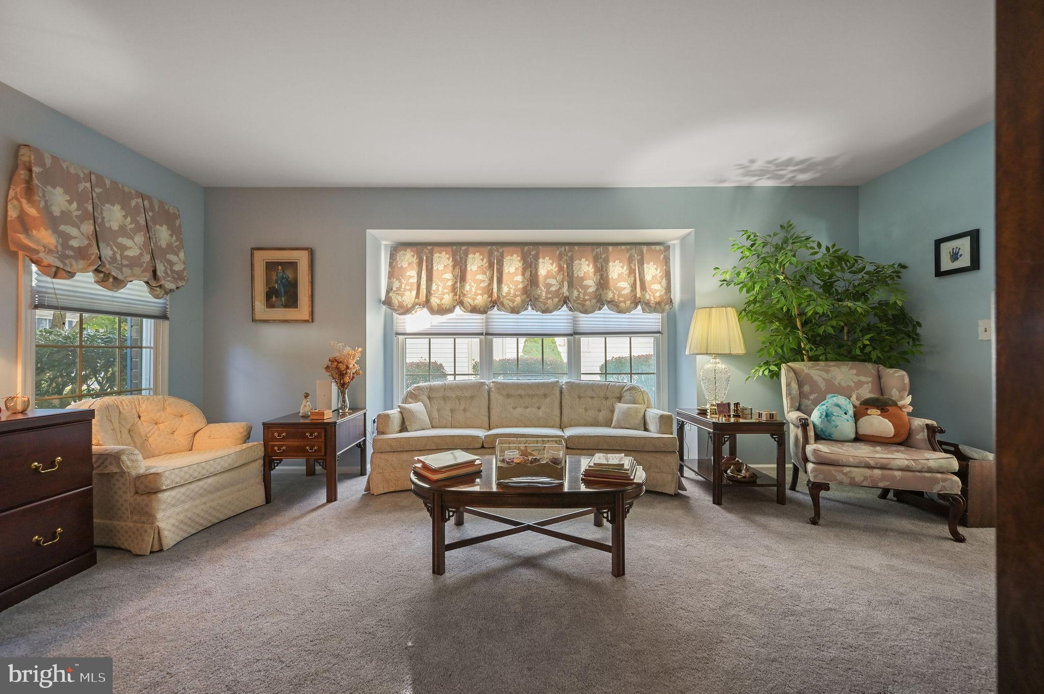 164 Burning Tree Road Dover, DE 19904 - Photo 8 of 37 a living room with furniture and a window