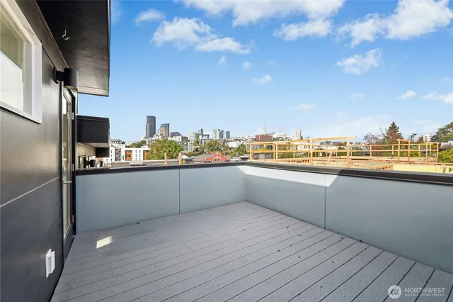 a kitchen with stainless steel appliances granite countertop a refrigerator and a stove