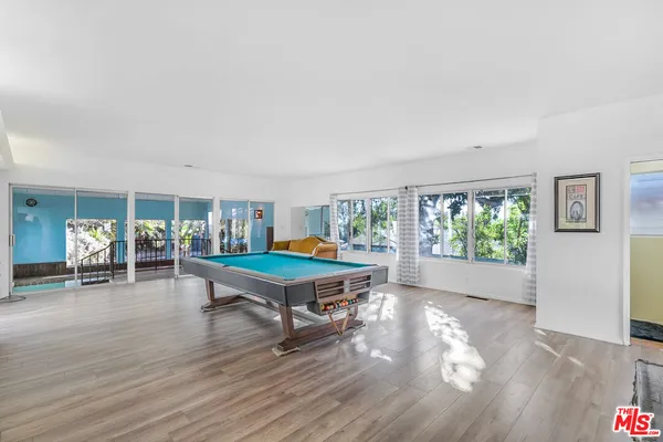 a view of a swimming pool and outdoor space