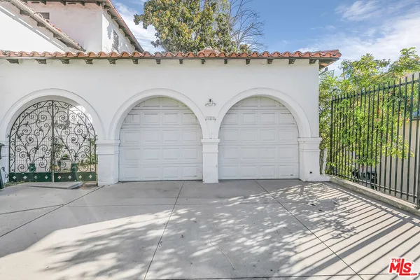a view of entrance gate of a house