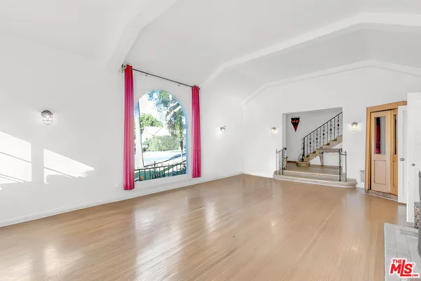 a view of entryway with wooden floor