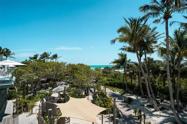 a view of swimming pool with outdoor seating