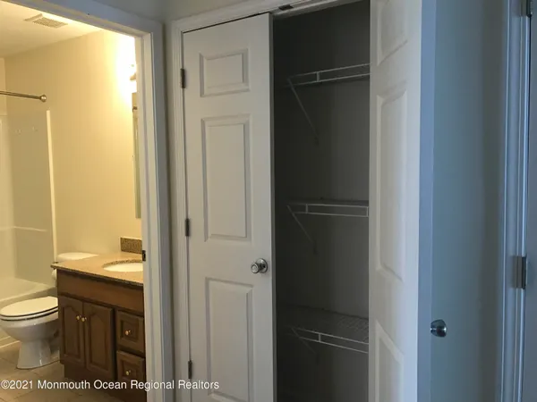 a bathroom with a toilet and a sink