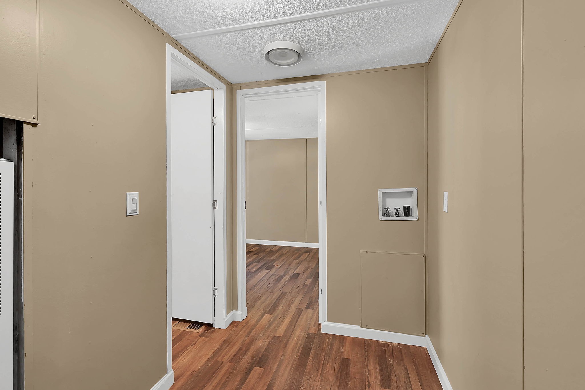 660 Rogues Fork Road Bethpage, TN 37022 - Photo 16 of 55 a view of a hallway with wooden floor