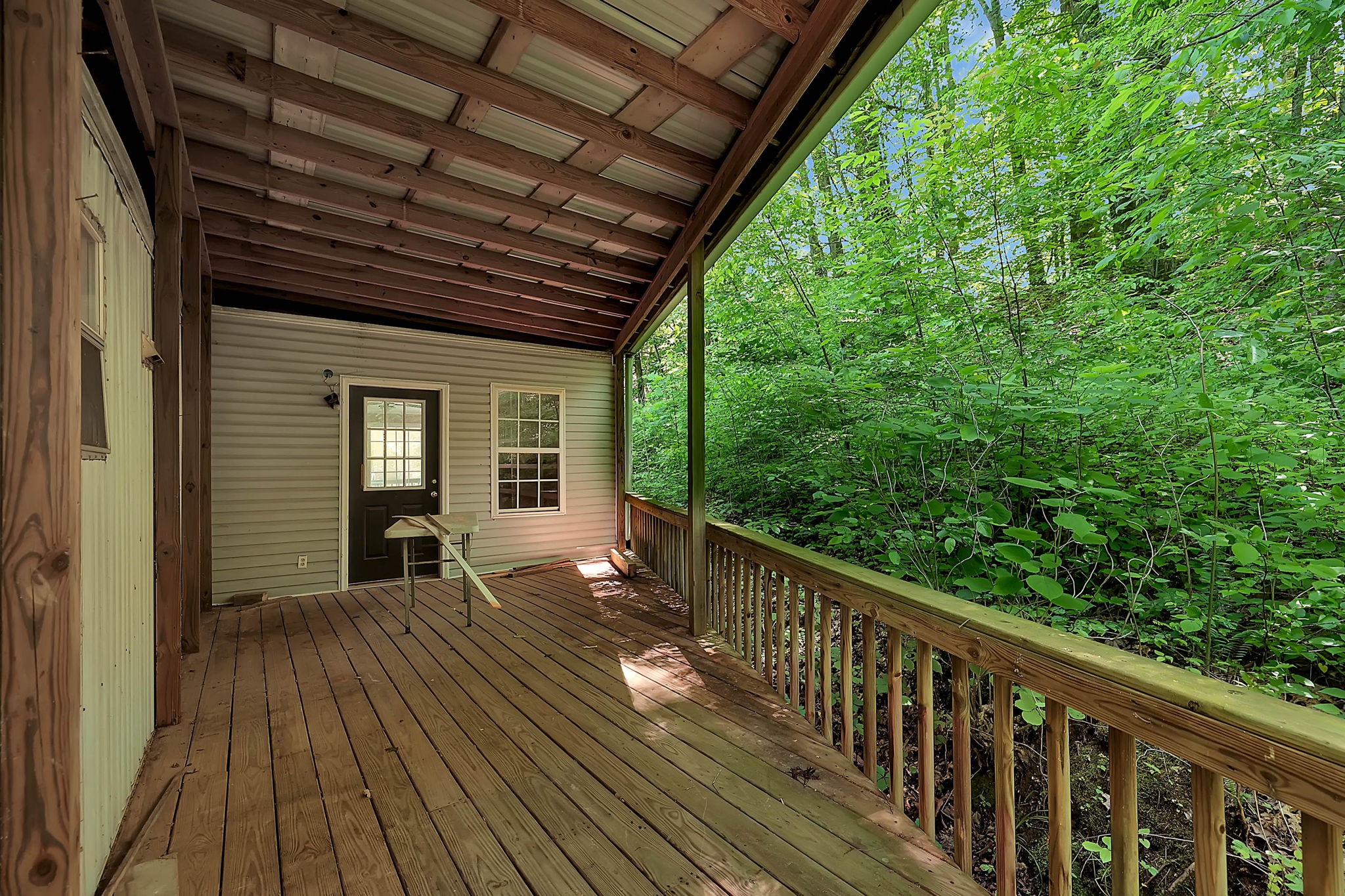 660 Rogues Fork Road Bethpage, TN 37022 - Photo 23 of 55 a view of a balcony with wooden floor
