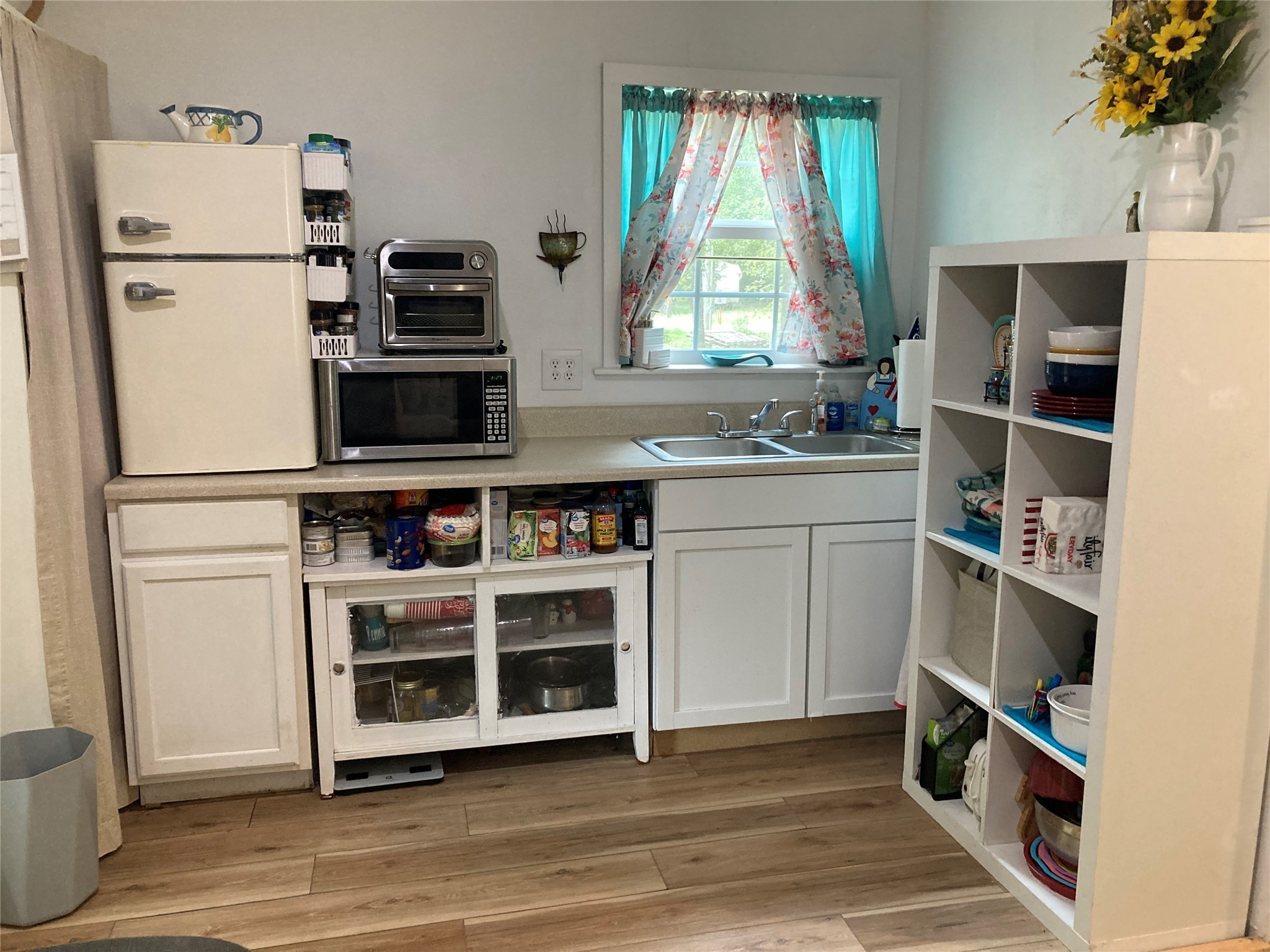 204 Knottypine Livingston, TX 77351 - Photo 15 of 30 a view of kitchen with cabinets and wooden floor