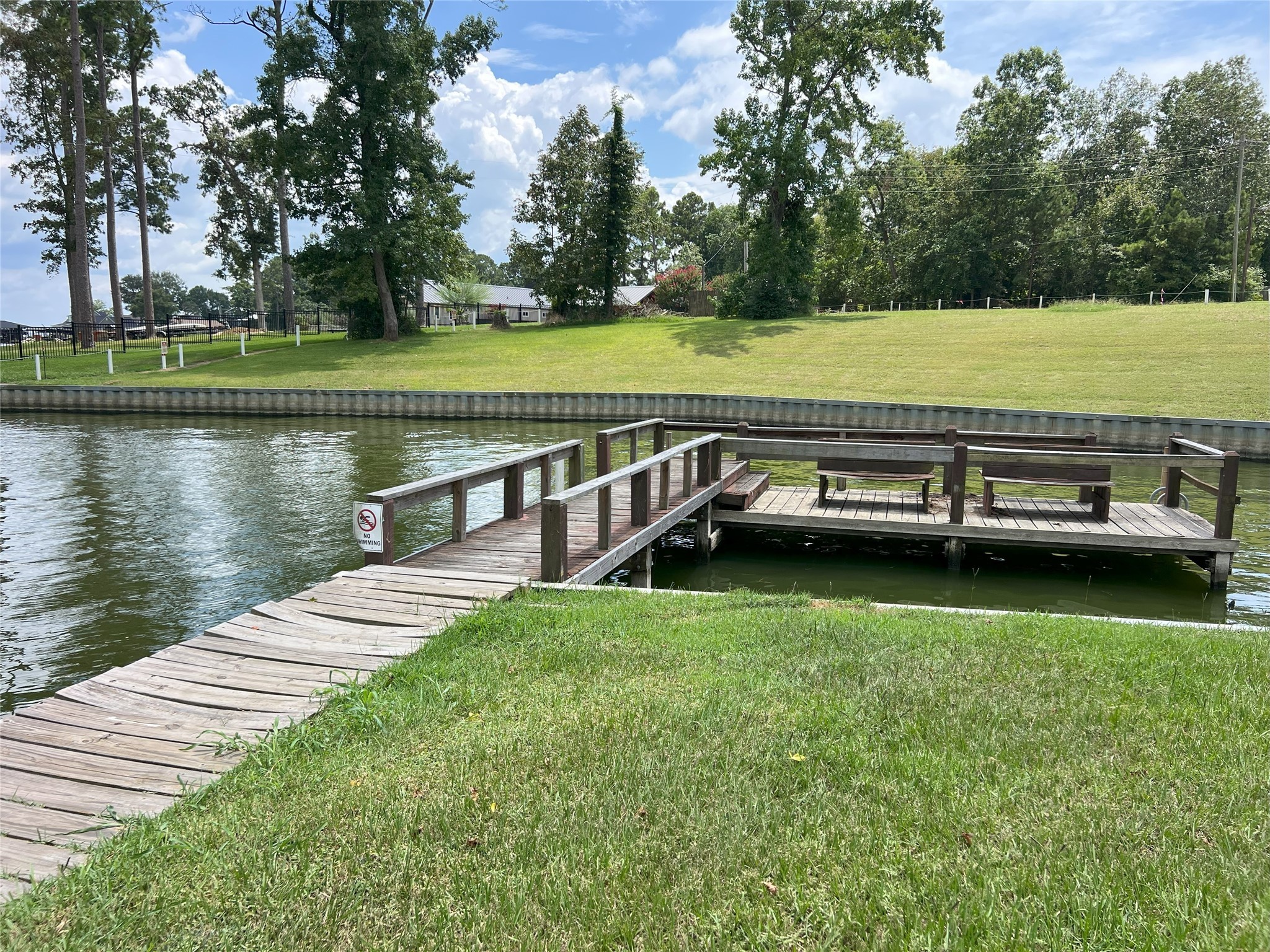 204 Knottypine Livingston, TX 77351 - Photo 27 of 30 a view of a wooden deck with lake view