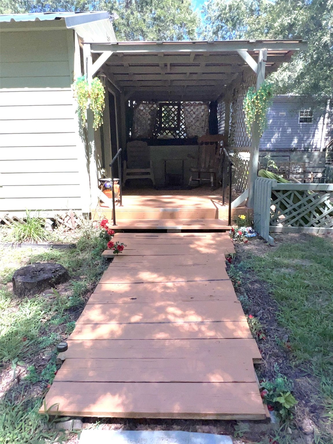 204 Knottypine Livingston, TX 77351 - Photo 9 of 30 a view of a pathway both side of house