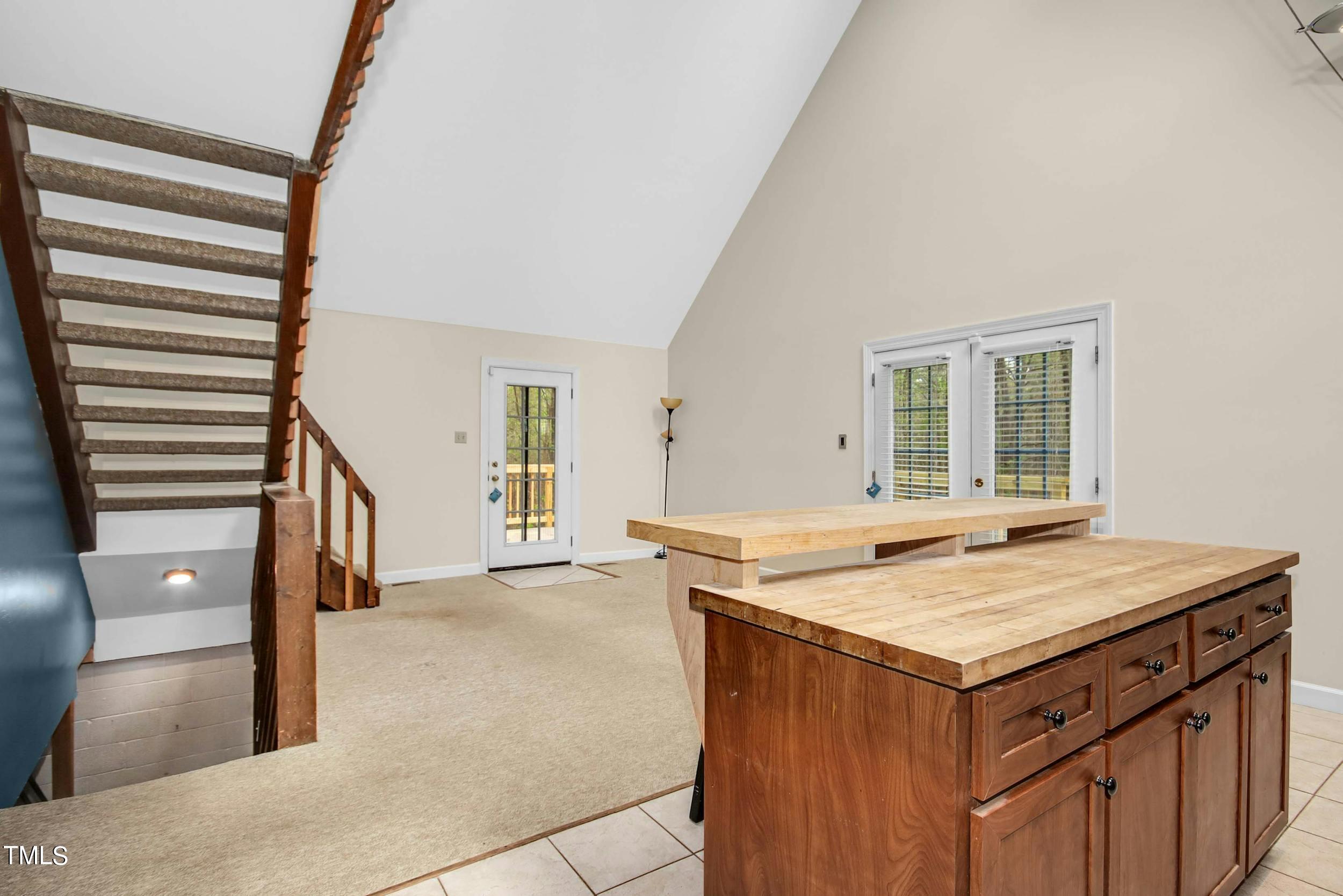 2609 Carpenter Pond Road Raleigh, NC 27613 - Photo 11 of 33 a kitchen that has a sink and a stove