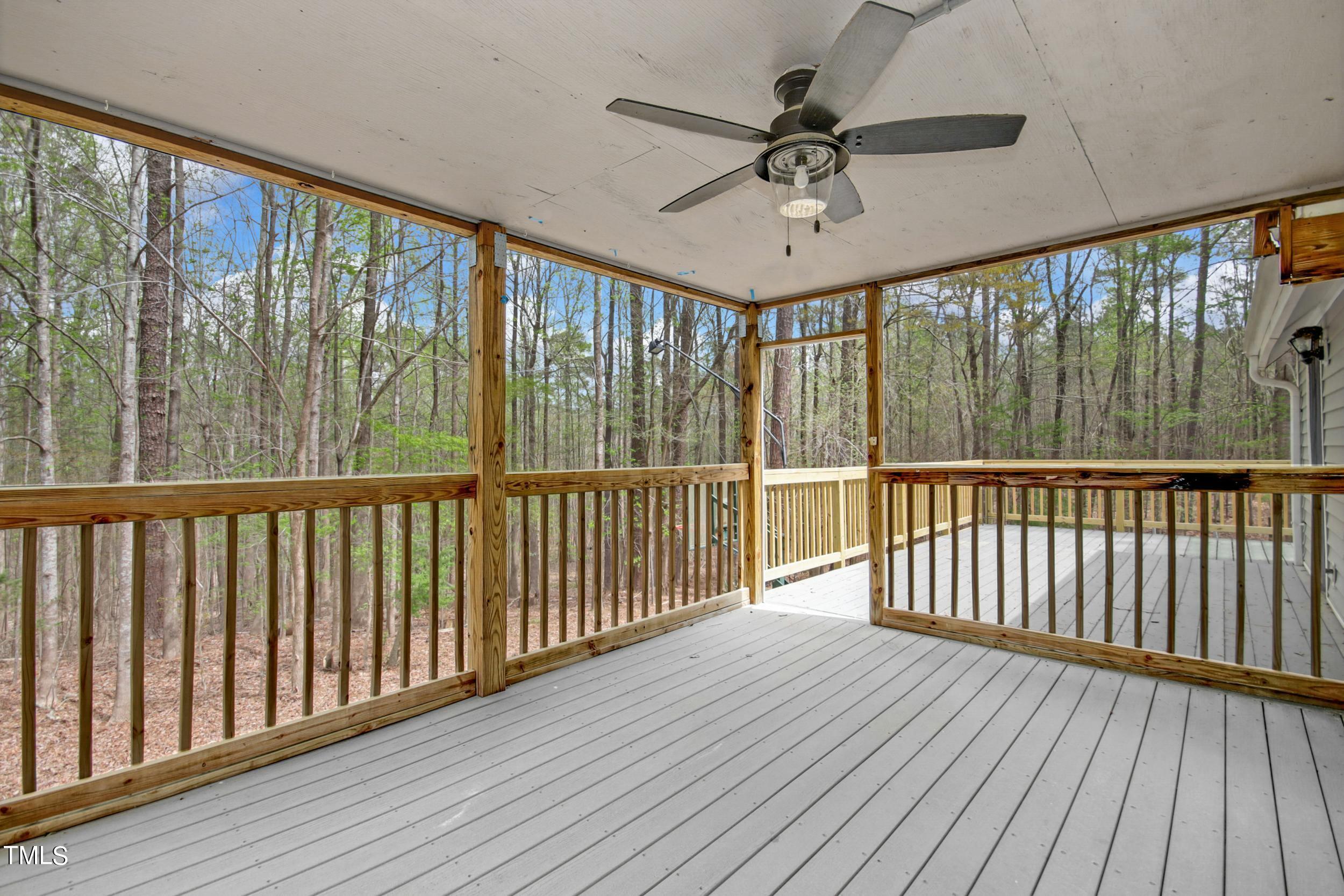 2609 Carpenter Pond Road Raleigh, NC 27613 - Photo 27 of 33 a view of a porch with wooden floor