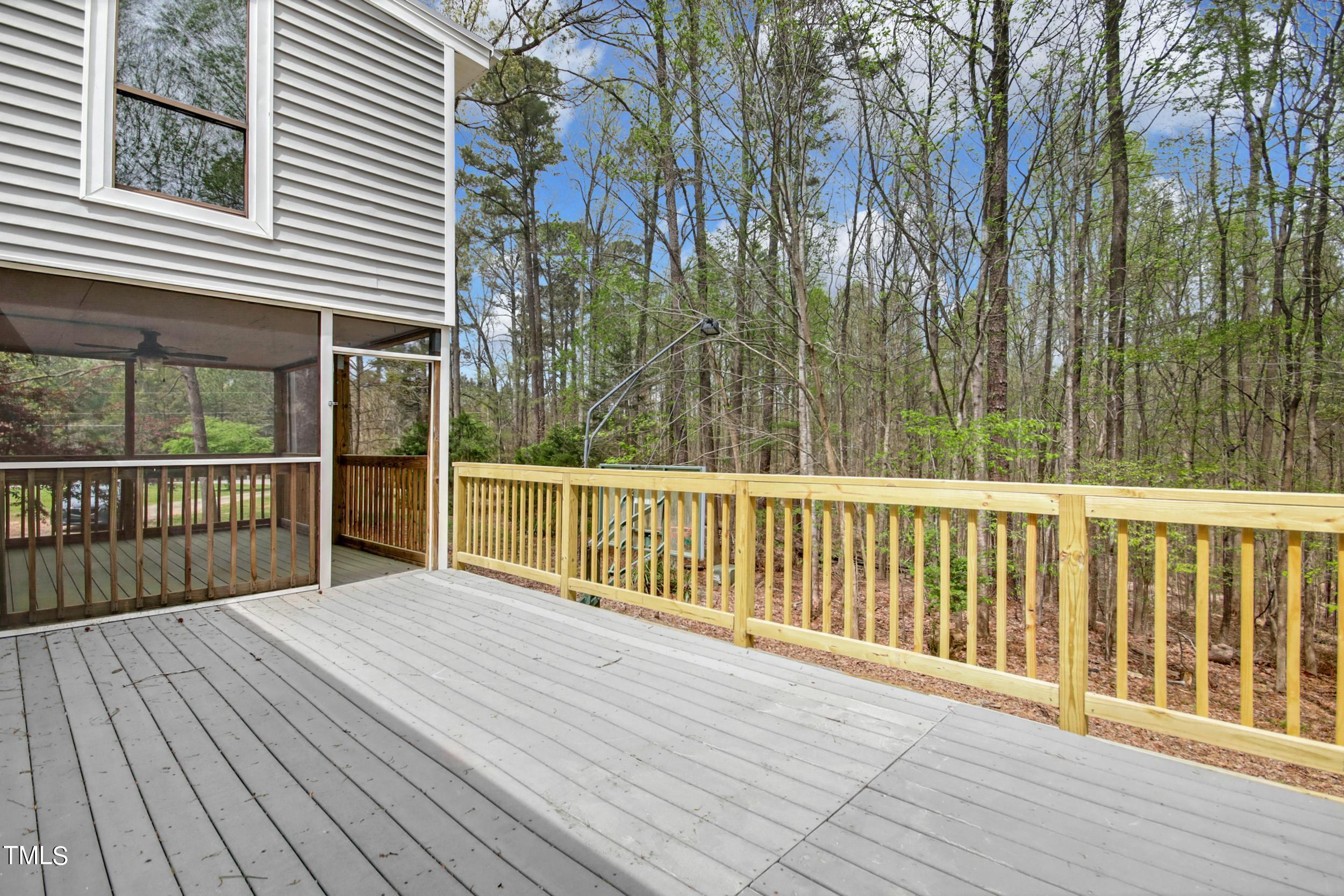 2609 Carpenter Pond Road Raleigh, NC 27613 - Photo 28 of 33 a view of a wooden balcony