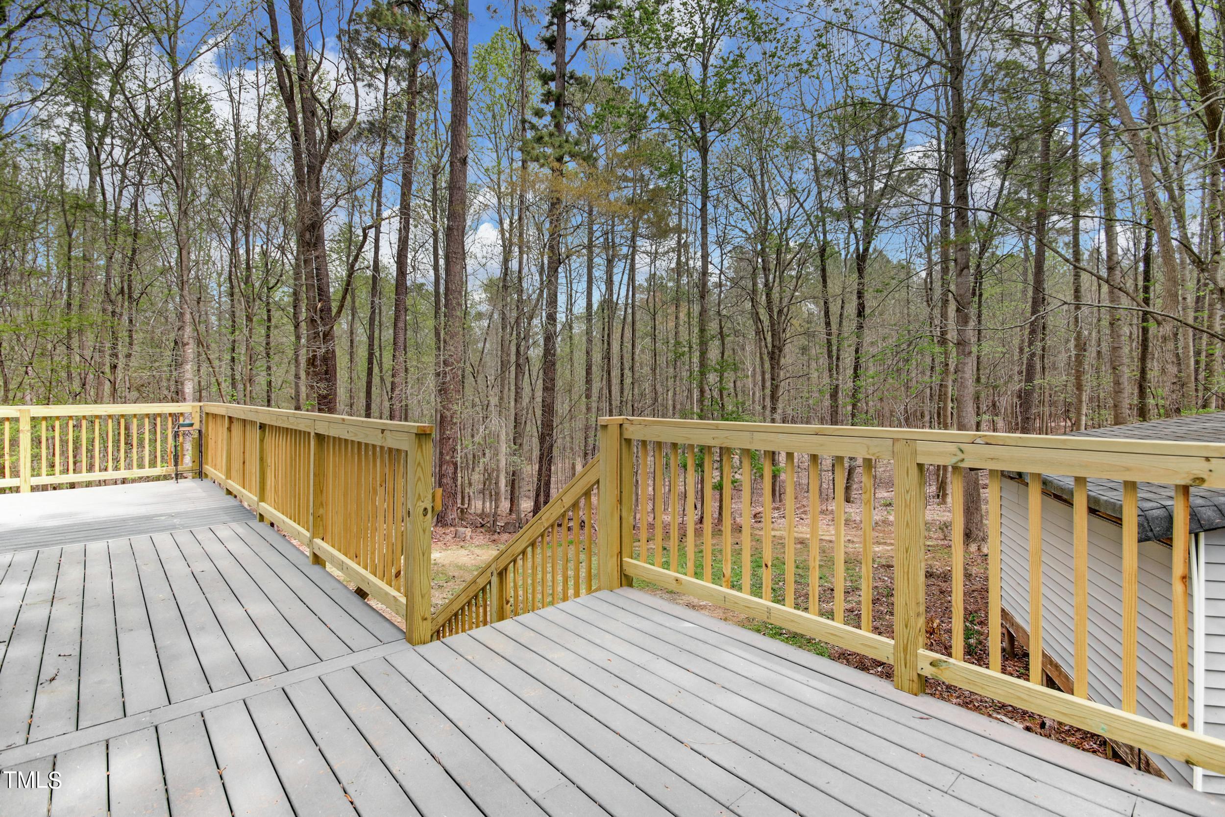 2609 Carpenter Pond Road Raleigh, NC 27613 - Photo 29 of 33 a view of balcony with wooden floor and fence