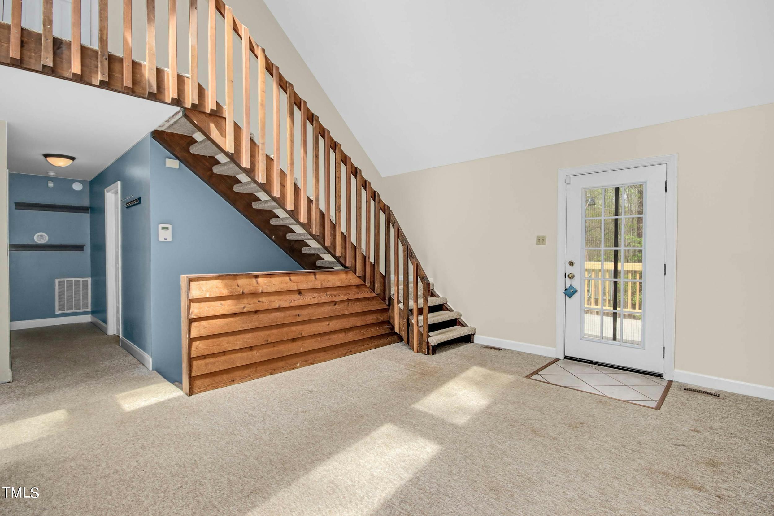 2609 Carpenter Pond Road Raleigh, NC 27613 - Photo 5 of 33 a view of entryway and hall with wooden floor