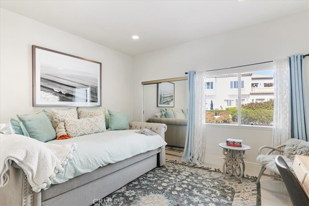 17 Centre Court Dana Point, CA 92629 - Photo 25 of 45 a bedroom with a bed and a window
