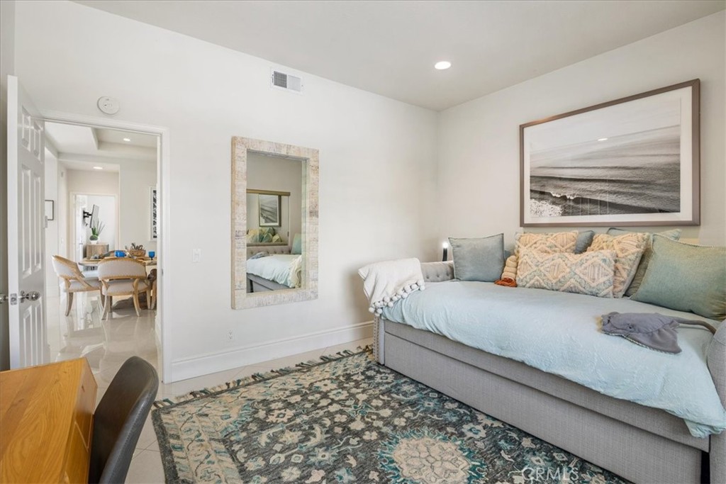 17 Centre Court Dana Point, CA 92629 - Photo 26 of 45 a bedroom with a bed and a painting on the wall