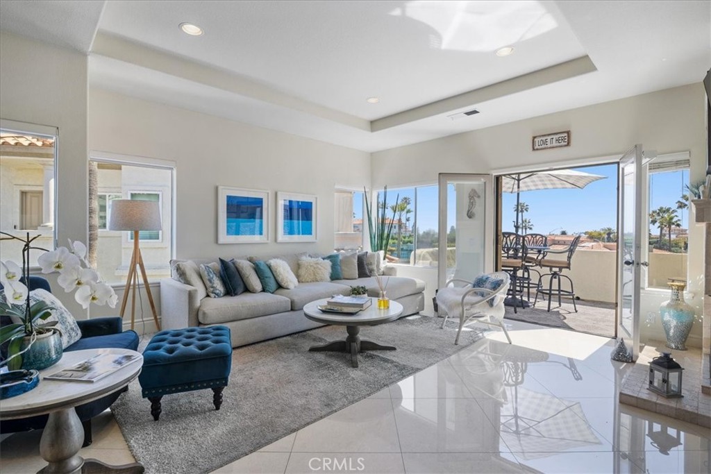 17 Centre Court Dana Point, CA 92629 - Photo 5 of 45 a living room with furniture and a large window