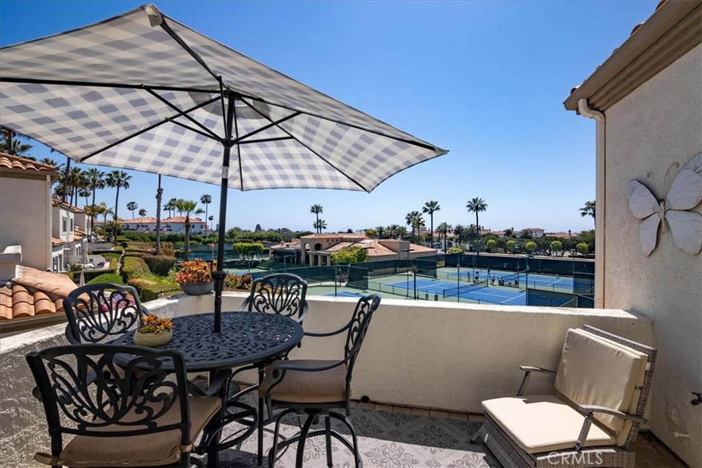 17 Centre Court Dana Point, CA 92629 - Photo 7 of 45 a view of a dining room with furniture and chandelier