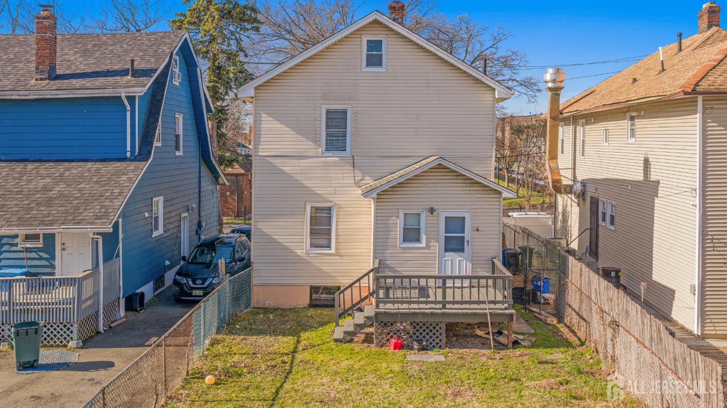 83 May Street Irvington, NJ 07111 - Photo 27 of 27 a front view of a house with a yard