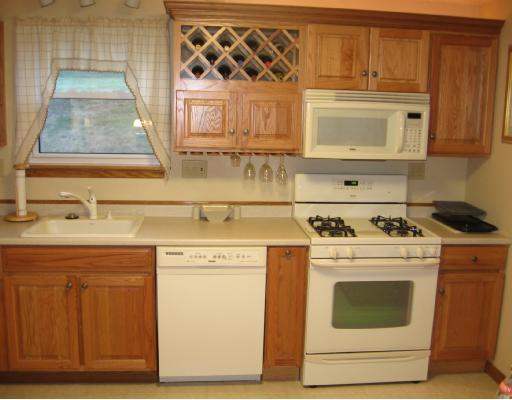 2607 Reiter Road Penn Hills, PA 15235 - Photo 3 of 18 Kitchen. STUNNING BRAND NEW KITCHEN, BUILT IN WINE RACK & SLOTS TO HANG GLASSES.