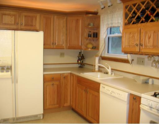 2607 Reiter Road Penn Hills, PA 15235 - Photo 4 of 18 Kitchen. AMAZING LIGHT OAK CABINETS, TRACK & RECESSED LIGHTING, & UPDATED APPLIANCES THAT ARE INCLUDED WITH THE HOME.