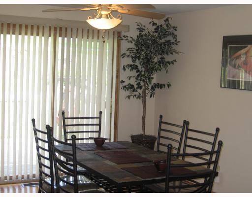 2607 Reiter Road Penn Hills, PA 15235 - Photo 7 of 18 Dining Room. LIGHTED CEILING FAN IN THE FORMAL DINING ROOM, WITH UPDATED SLIDING DOORS TO THE DECK.
