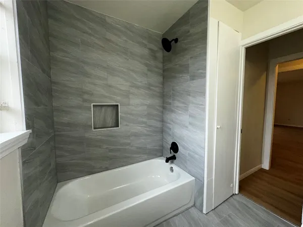 a bathroom with a bathtub