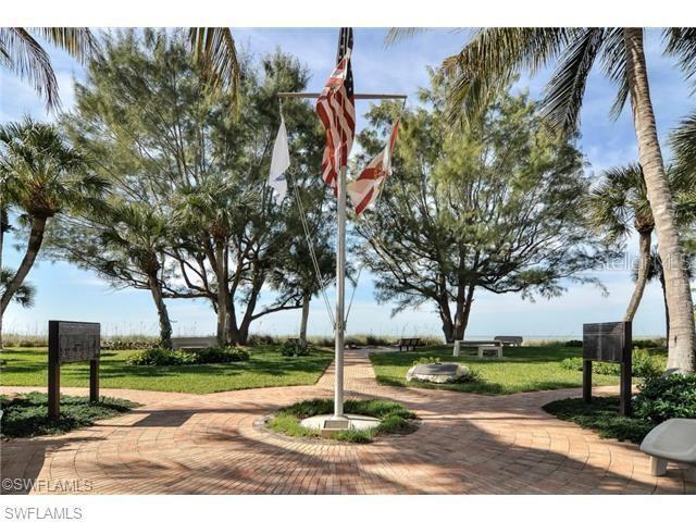 1900 Alamanda Drive, Unit 305 Naples, FL 34102 - Photo 13 of 17 a park with full of palm trees