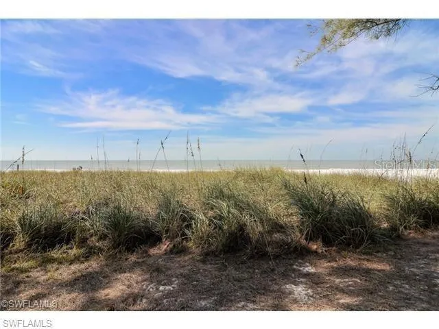 a view of a lake and mountain in the back