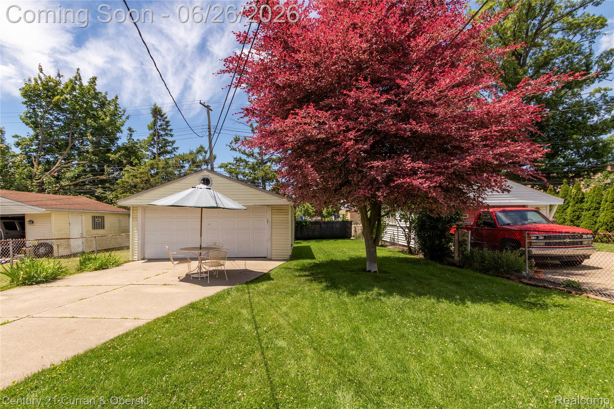 3220 Alice Street Dearborn, MI 48124 - Photo 37 of 39 Spacious green lawn with mature red foliage tree