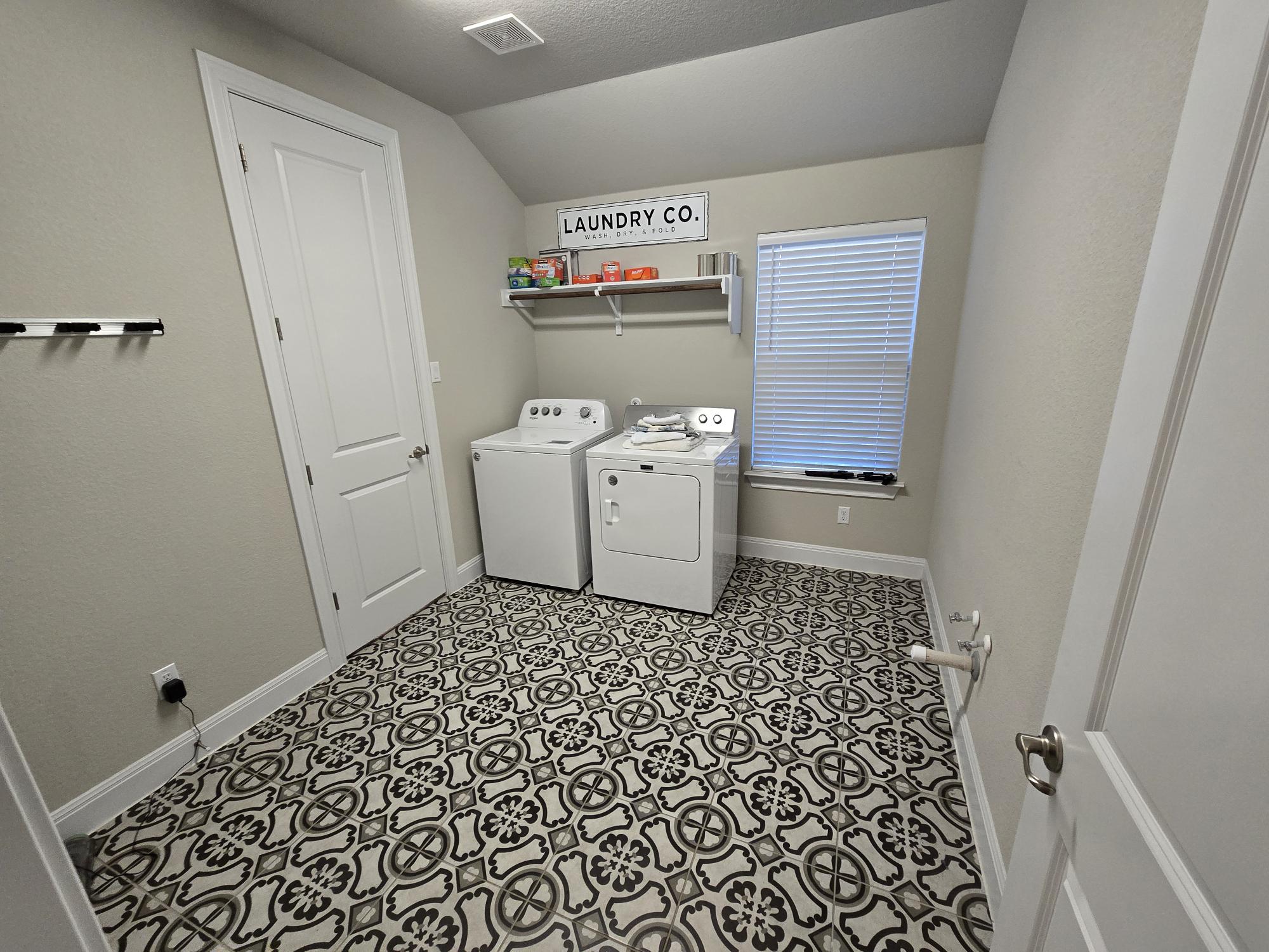 539 Tanda Lane Hutto, TX 78634 - Photo 16 of 18 a bathroom with a sink and a toilet