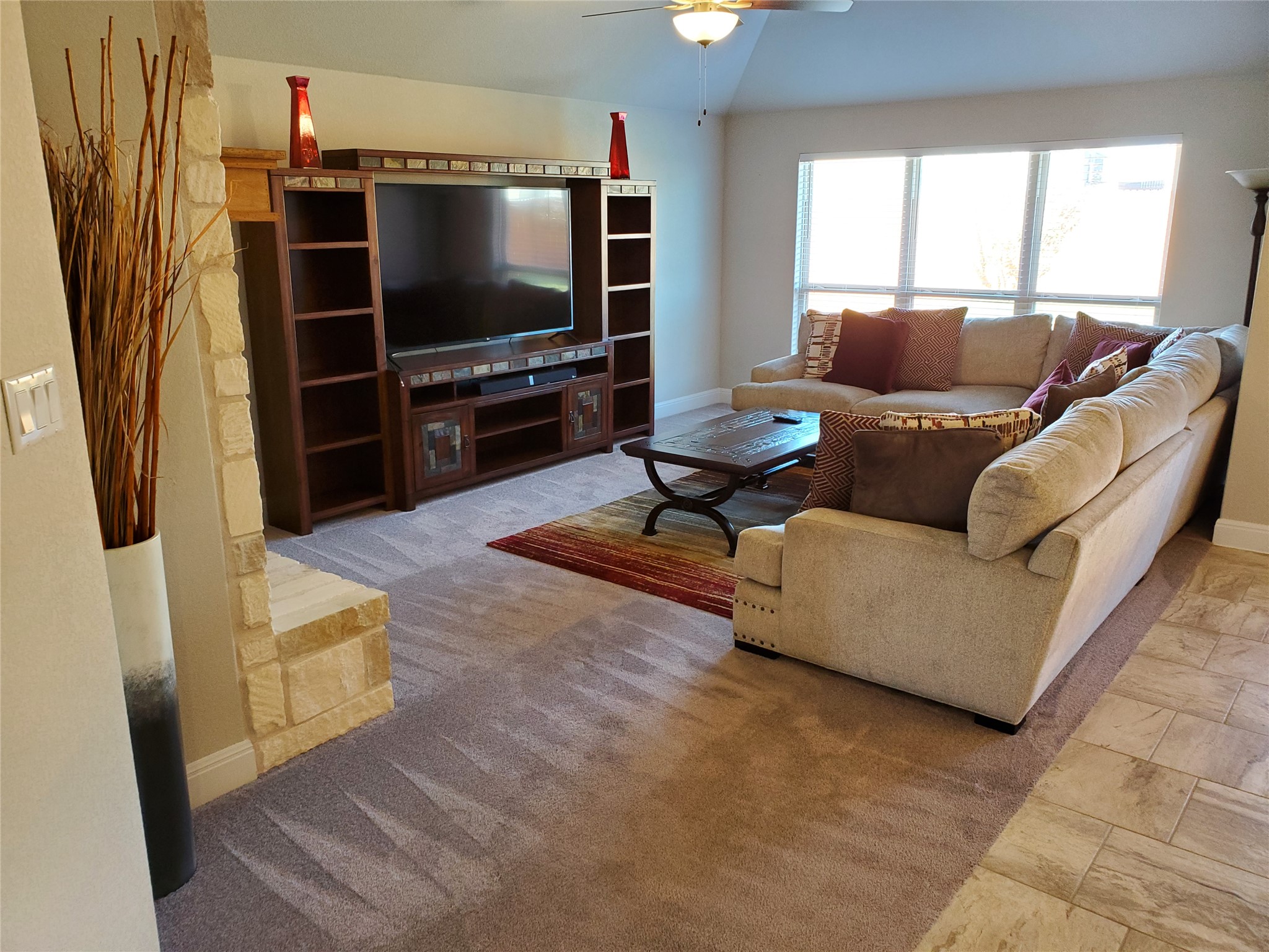539 Tanda Lane Hutto, TX 78634 - Photo 3 of 18 a living room with furniture and a flat screen tv