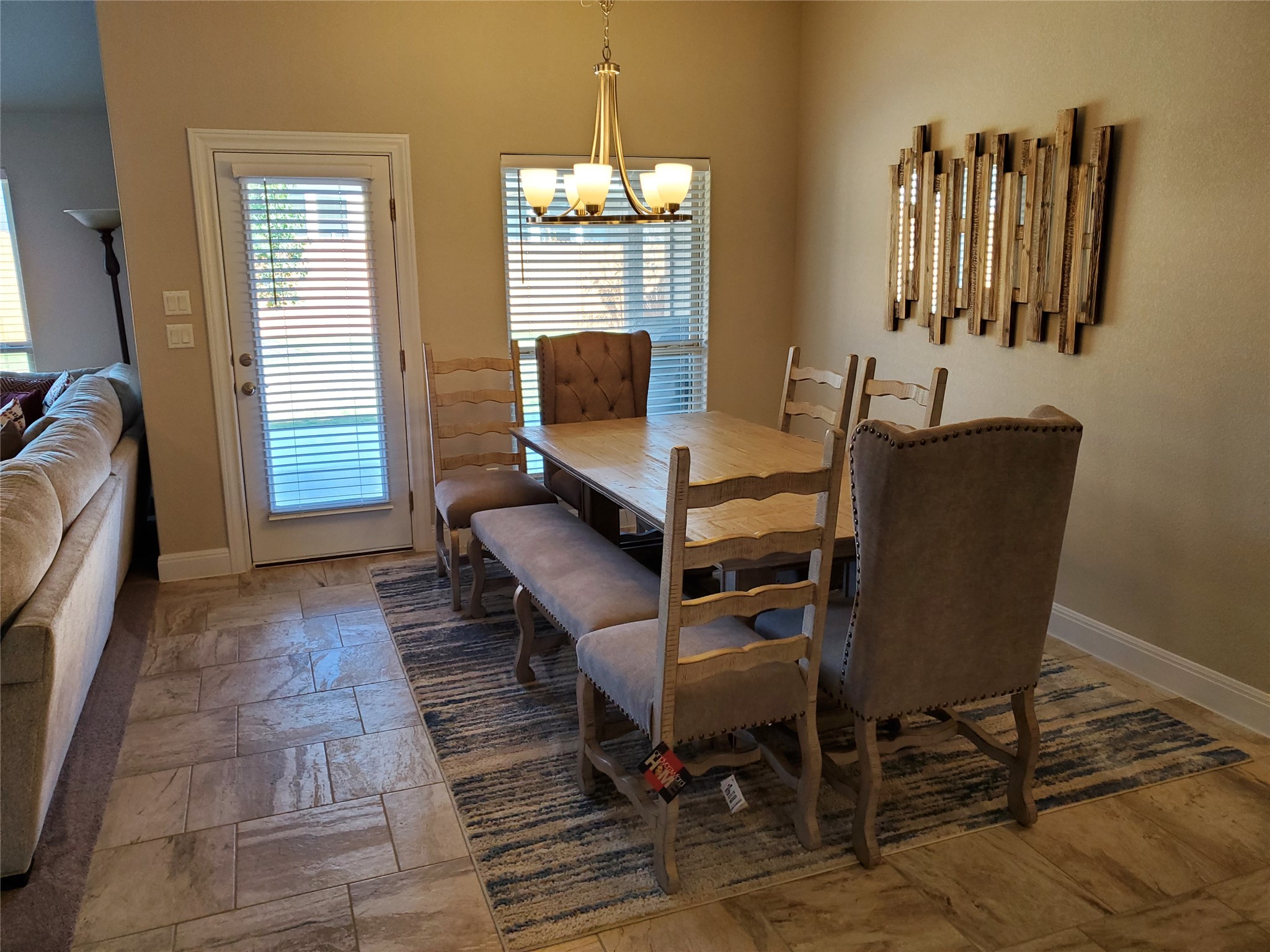 539 Tanda Lane Hutto, TX 78634 - Photo 8 of 18 a view of a dining room with furniture and a window
