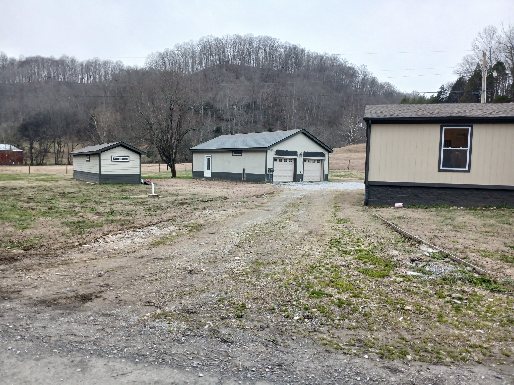 655 Wilmore Hollow Road Pleasant Shade, TN 37145 - Photo 30 of 47 a view of a house with a yard
