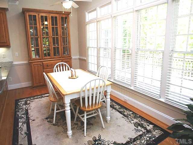 5400 Fire Pink Way Raleigh, NC 27613 - Photo 7 of 24 BreakFast Area off the Main Kitchen Overlooks Deck and Private Back Yard.