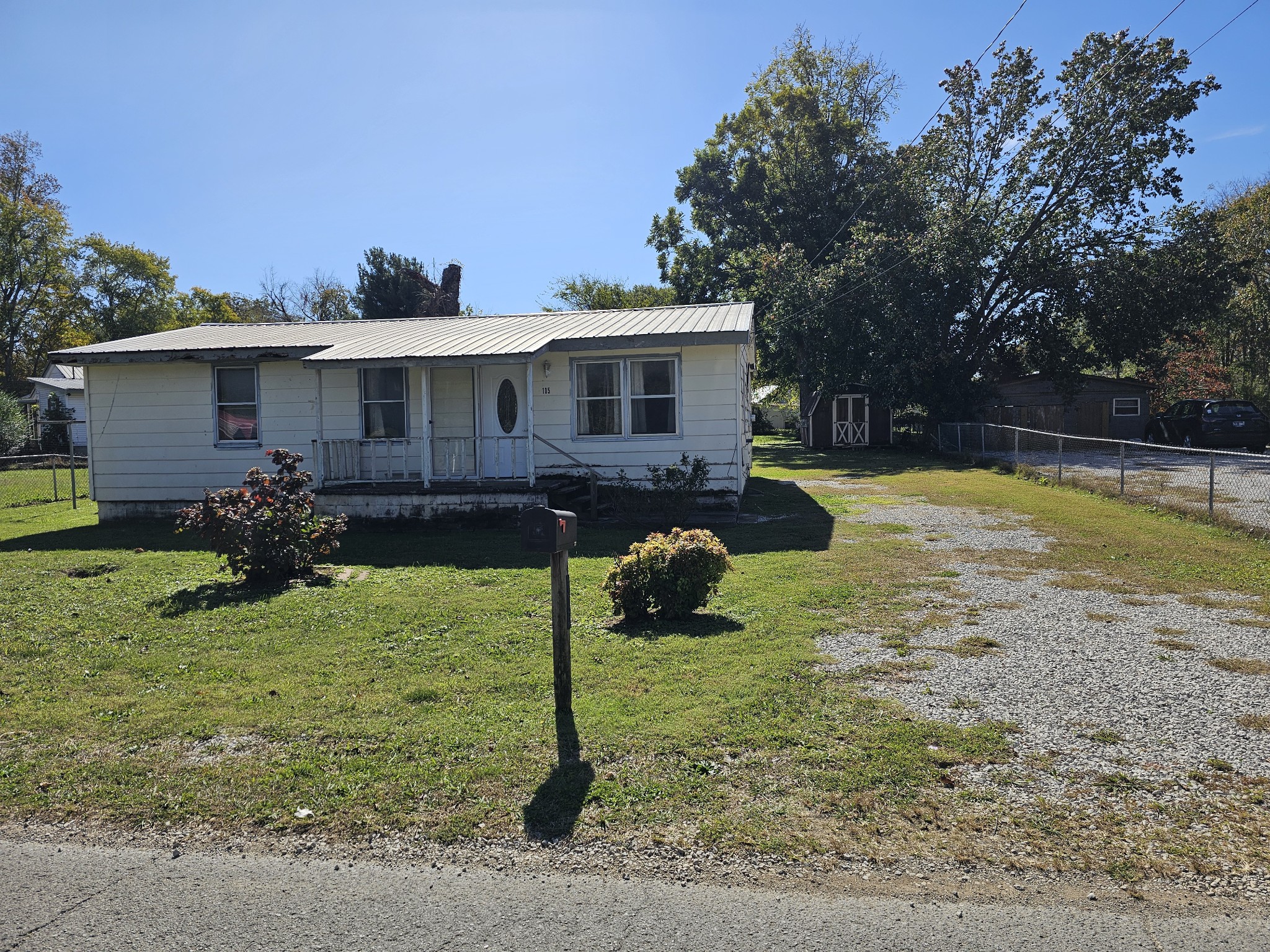 105 East Market Street Decherd, TN 37324 - Photo 1 of 12 a view of a house with backyard and sitting area