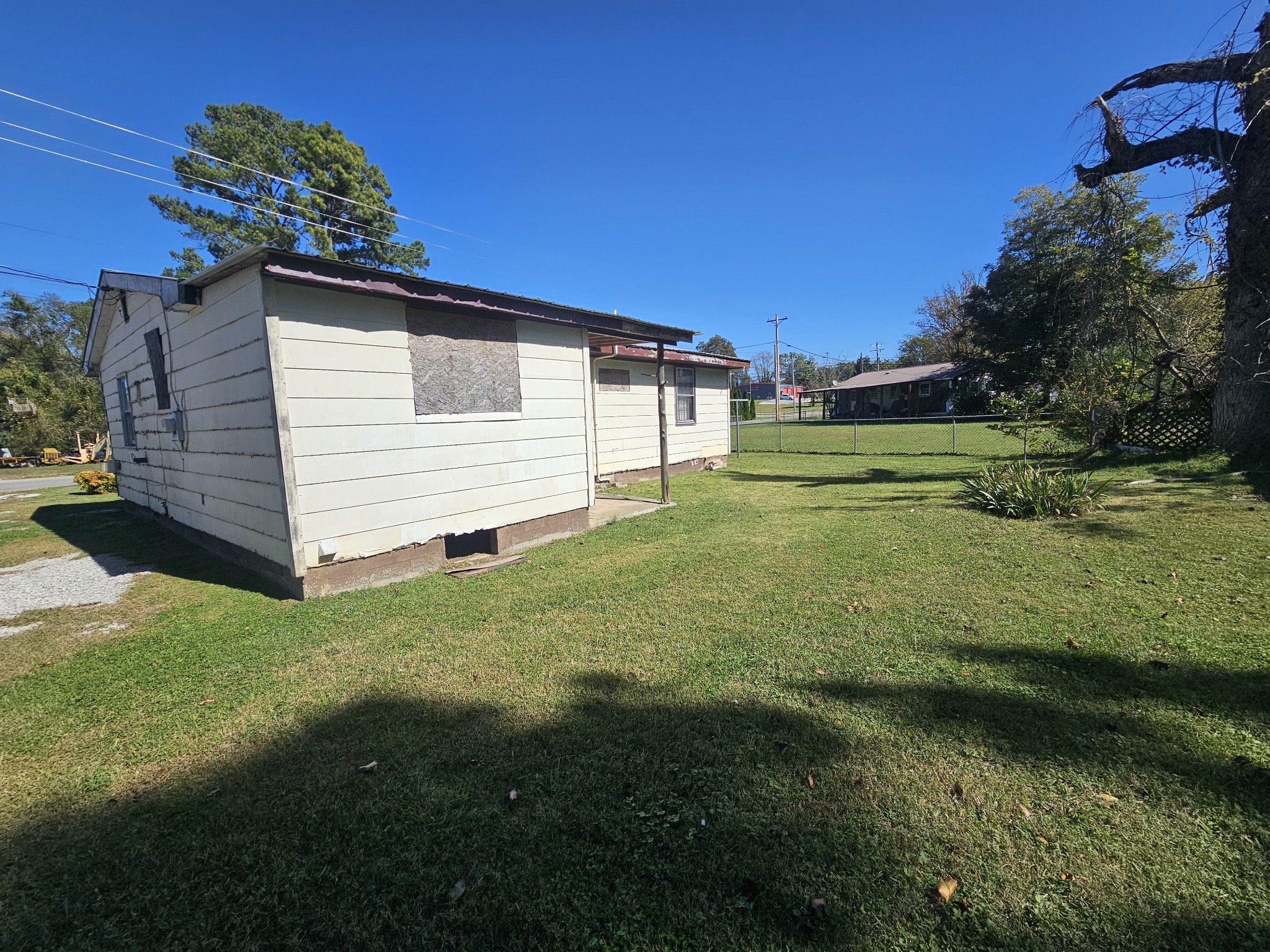105 East Market Street Decherd, TN 37324 - Photo 2 of 12 a front view of a house with a yard