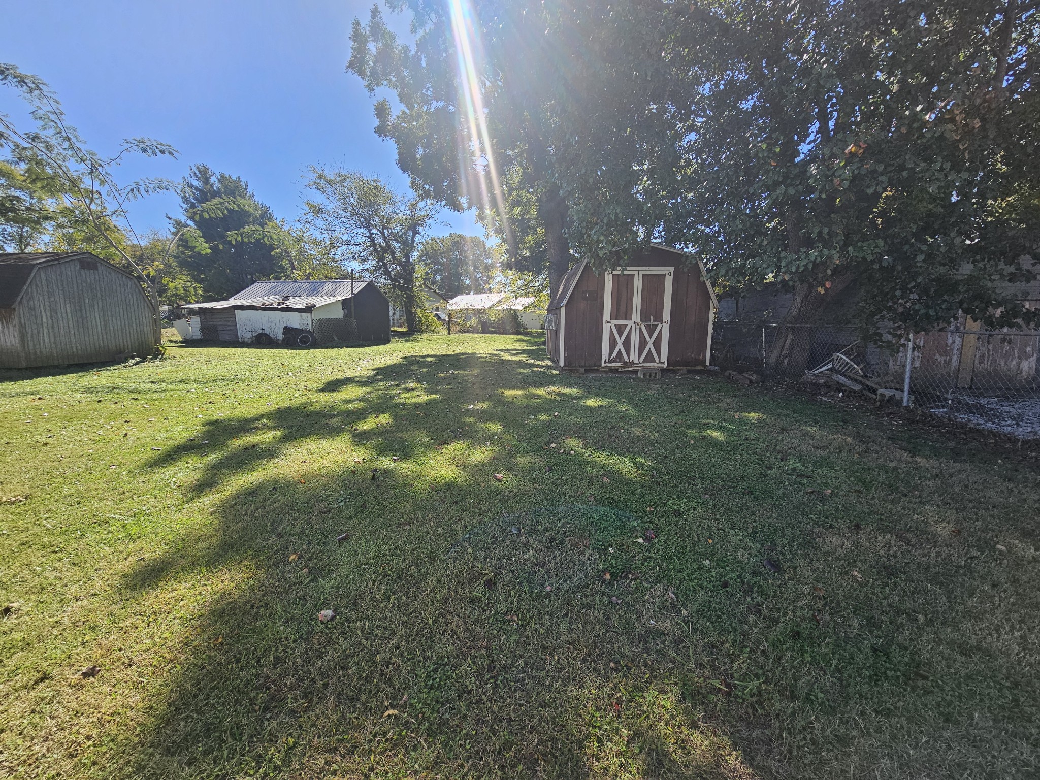 105 East Market Street Decherd, TN 37324 - Photo 3 of 12 a view of a big yard with large trees