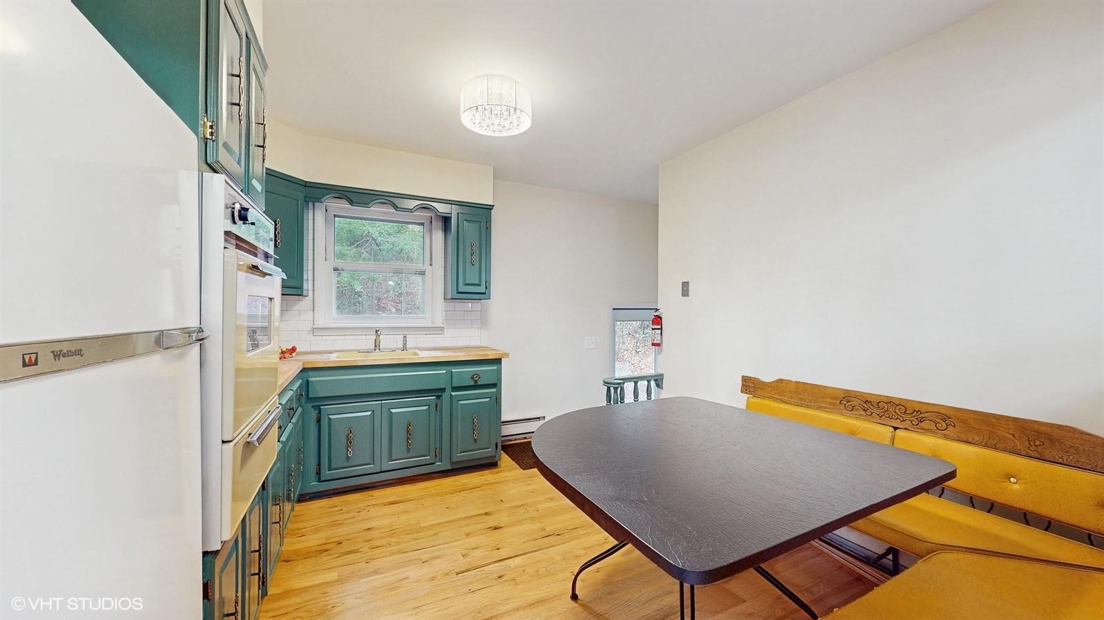 736 State Rte 55 Napanoch, NY 12458 - Photo 11 of 49 a bathroom with a sink mirror and a bath tub